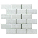 Vintage Fleur De Lys mosaic white tile in a 3 x 6 rectangular format, showing the subtle flower embossed pattern