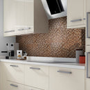 Glimmer Copper mosaic being used in a cream kictchen as a splashback