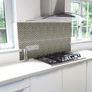 Hammersmith self-adhesive mosaic tile being used as a splashback in a kitchen behind a hob