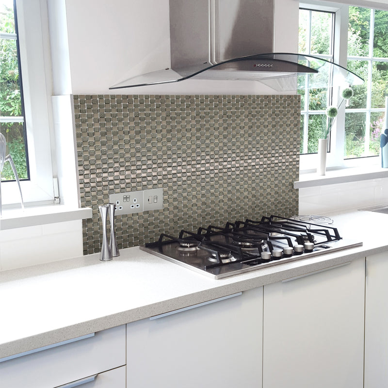 Hammersmith self-adhesive mosaic tile being used as a splashback in a kitchen behind a hob