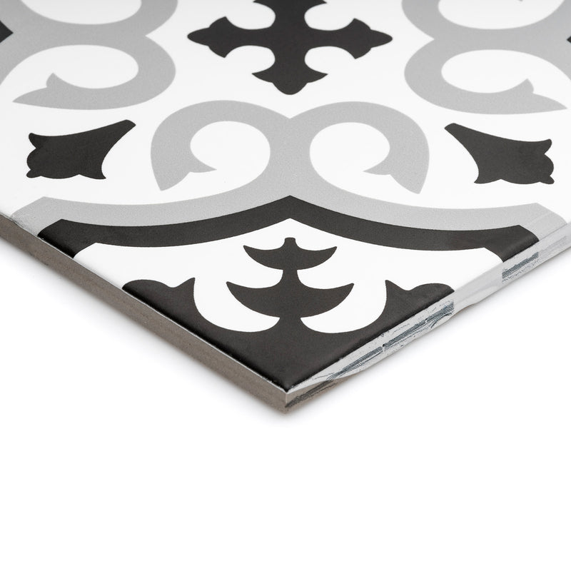 Side on image showing the side of the Classic tile, and the corner of they black, white and grey floral pattern