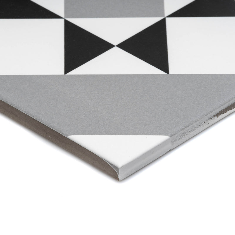 Side on image showing the Diamond tile from the Floral collection from the side, and the grey, black and white geometric floral pattern