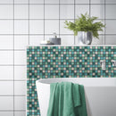 A lifestyle image of Aquamarine in a bathroom, being used behind the bath to make a statement zoned area.
