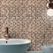 Glamour Bronze Mosaic lifestyle image showing the product being used in the bathroom, behind a sink