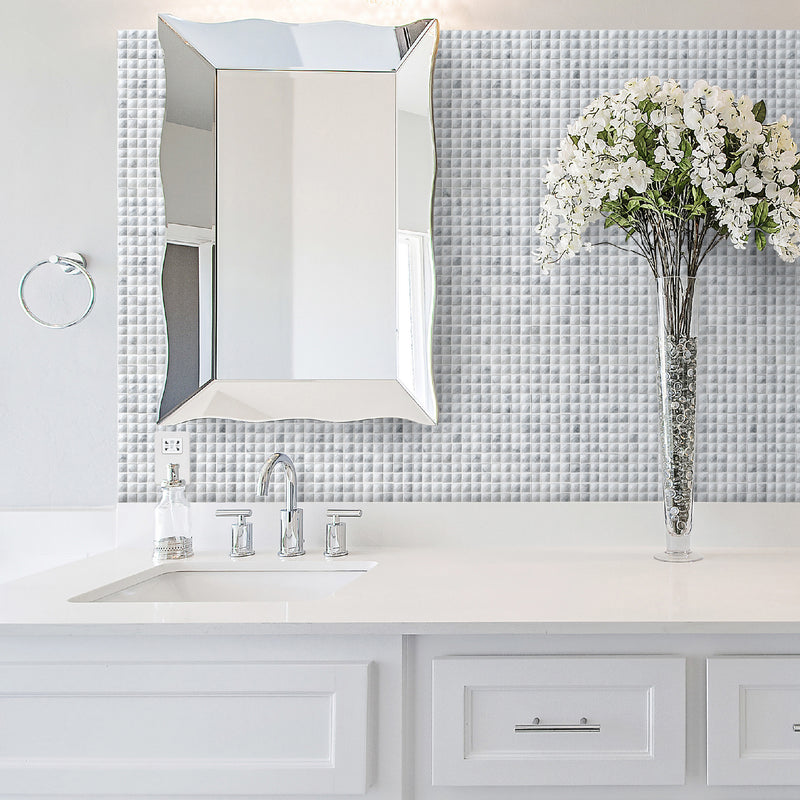 Vienna Luxe mosaic lifestyle image being used in a bathroom as a feature wall behind the sink. Also features a mirror on the wall.