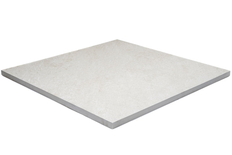 Product image of Outdoor Porcelain 600mm x 600mm x 20mm tile, in Grove, showing the cream, stone effect tile, from the side