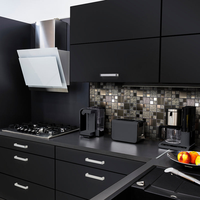Gunmetal Luxe lifestlye image showing the mosaic being used in a black kitchen, as a splashback behind appliances