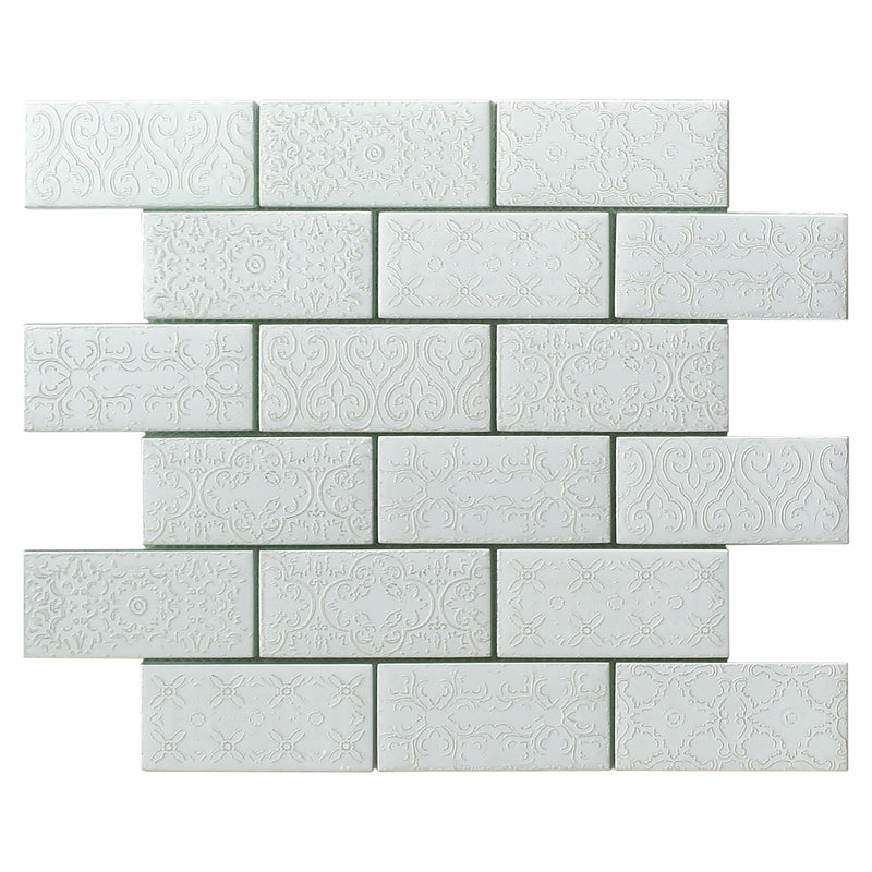 Vintage Fleur De Lys mosaic white tile in a 3 x 6 rectangular format, showing the subtle flower embossed pattern